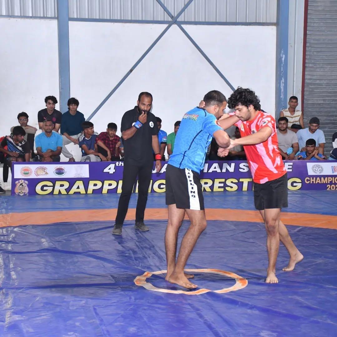 Action shot from the district-level grappling competition